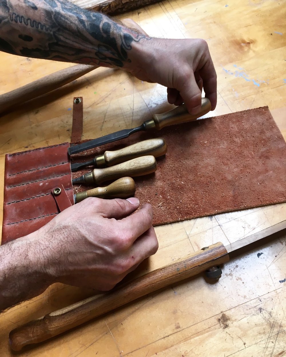  Inverness artist, Ido Yoshimoto, displaying the hand tools made for him by neighboring artist, Kelson Isaiello, whose work will also appear in the show. 